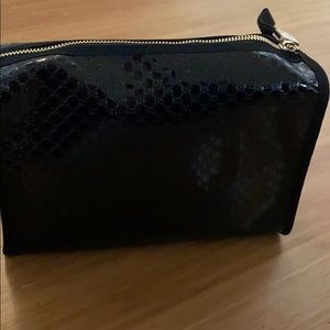 New! Gucci travel makeup bag.